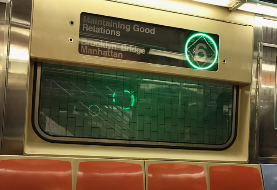 banner shown in New York subway for audio broadcast of Maintaining Good Relations